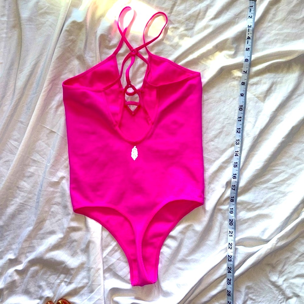 Free People  Keep it Sleek deep v pink thong bodysuit size m/L
